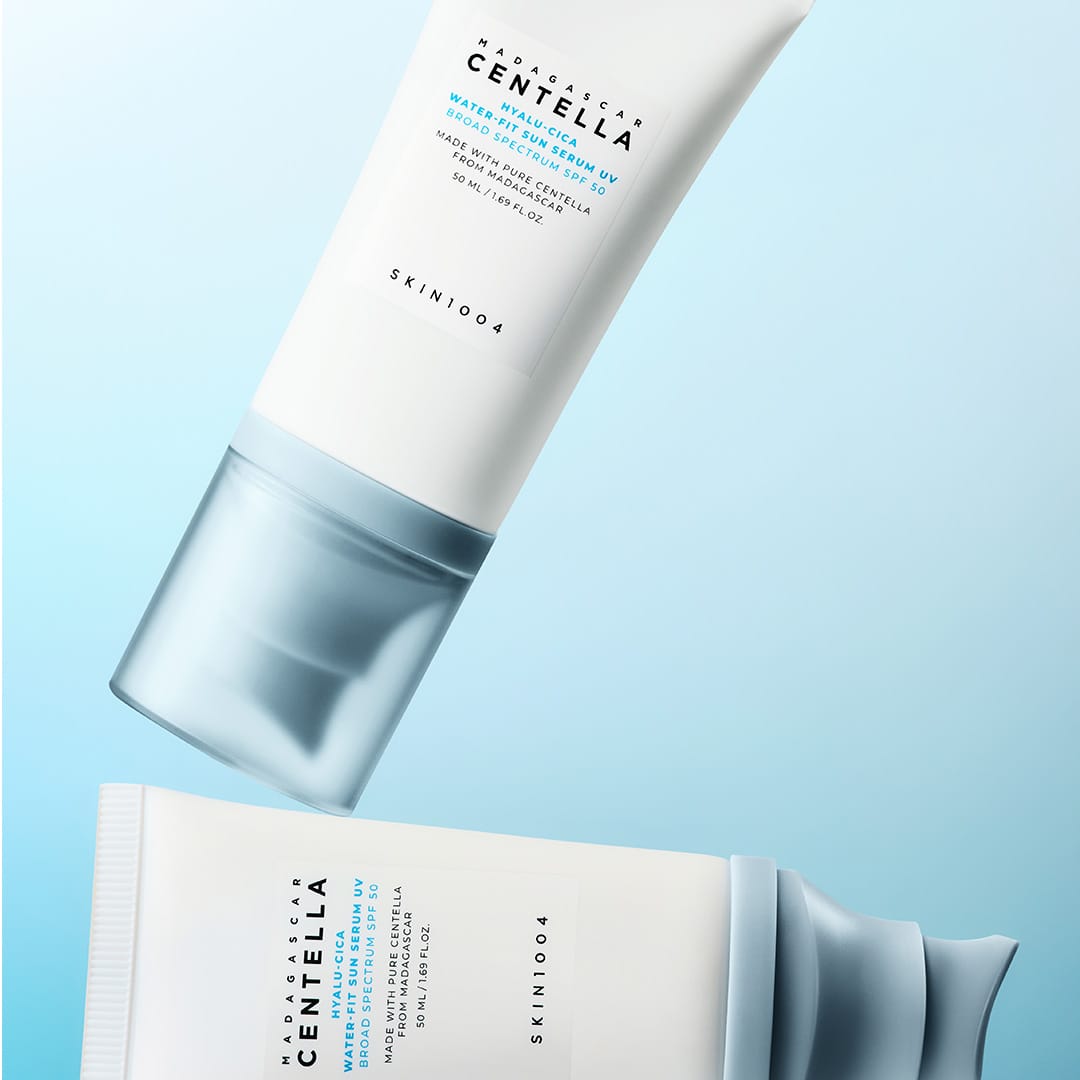 Spreading sunscreen on face